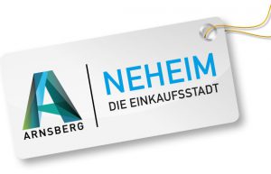 Der altbekannte "Kofferanhänger" des Aktiven Neheim mit dem neuen "Arnsberg-A" als Symbol des gesamtstädtschen Werbeauftritts.